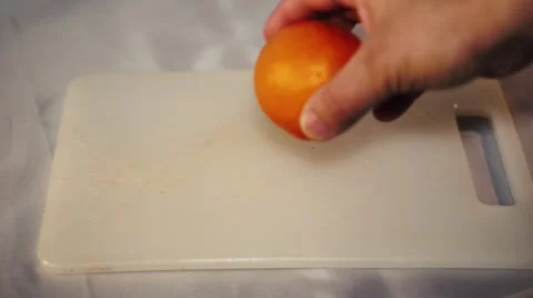 Men who cut the orange Stock Footage 63177904