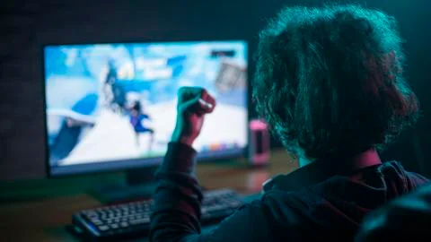Men wins computer game 스톡 사진