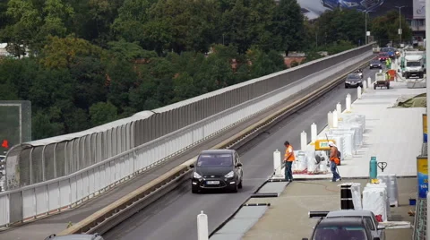 Men work on a bridge in Prague Stock Footage 40726591
