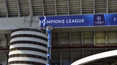 Men at work to decorate the San Siro stadium in Milan, Italy Stock Footage 63300869