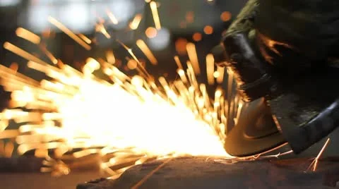 Men at work grinding steel Stock Footage
