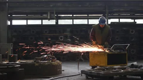 Men at work grinding steel Stock Footage 10718893