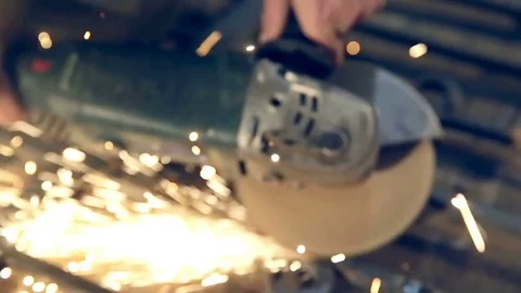 Men at work grinding steel Stock Footage 76426121