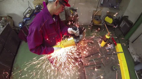 Men At Work Grinding Steel in Workshop Stock Footage 32170136