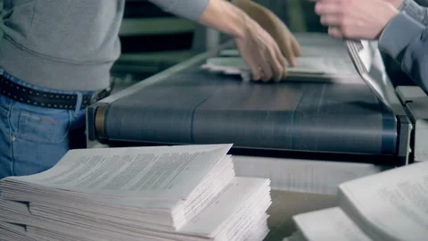 Men work with paper, stacking it, close up. Stock Footage 104224261