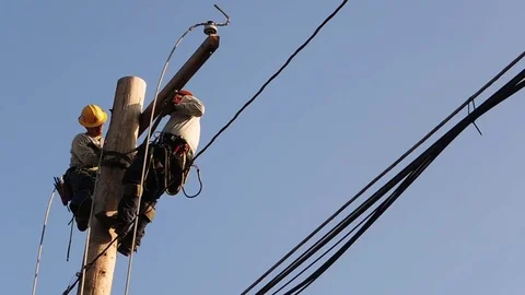 Men work on power line 스톡 동영상 73777879
