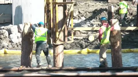 Men at Work on River Video stock 12599331