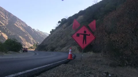Men at work on the road around the conor 스톡 동영상 54099777