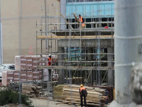 Men at work in tramway factory Stock Footage 75382457