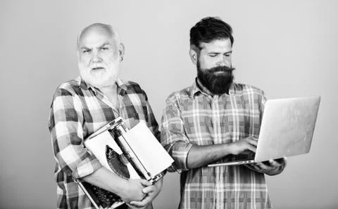 Men work writing devices. Old generation. Digital technologies. Senior man with 写真素材