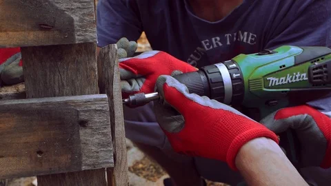 Men Working on Bench Making our of Pallets Stock Footage 125697603