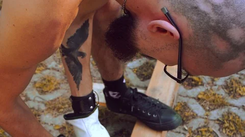 Men Working on Bench Making our of Pallets Stock Footage 125698427