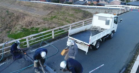 Men working on a bridge construction Stock Footage 161902943