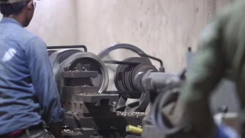 Men working a cleaning machine in factory. Industrial safety first concept. Stock Footage 296807560