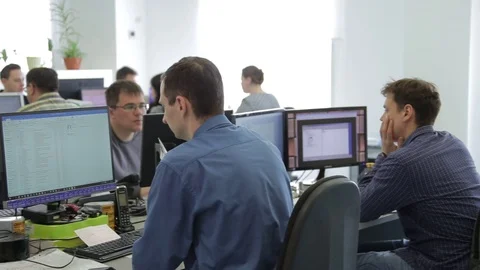 Men working at the computer in the office Stock Footage