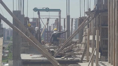  men working on the construction of a building Stock Footage 123799644