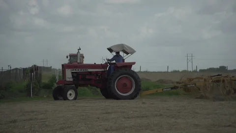 Men working on Farm Ranch and Cattle in countryside Stock Footage 111018616
