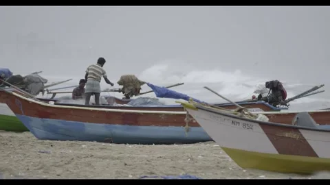 Men working with fishnets Stock Footage 299990289