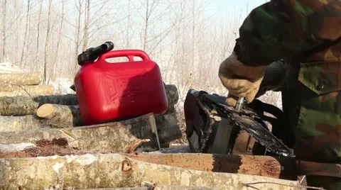 Men working at forest in winter, chainsaw, motorsaw repair, maintenance Stock Footage 10835464