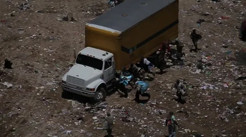 Men working in Guatemala Dump Stock Footage 61158071