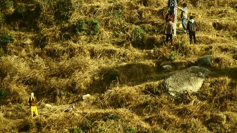 Men working on a hillock 2 Video stock 102778733