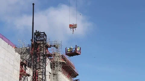 Men Working, Lowered in Crane at Panama Canal Expansion Project Stock Footage 44441981