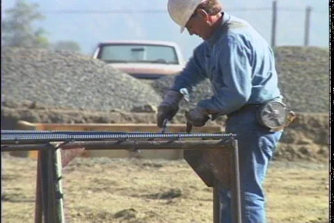 MEN WORKING ON REBAR Stock Footage 1049681