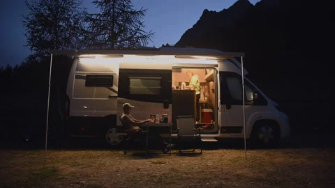 Men Working Remotely From Scenic Camping Using His Laptop and LTE Connection Stock Footage 141020801