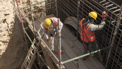 Men working together to build a new tunnel in Riyadh, Saudi Arabia Stock Footage 263716147