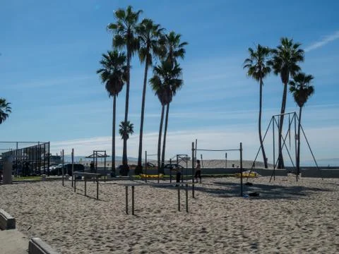 Men workout in open sandpit area of Venice Beach Muscle Beach area Stock Photos