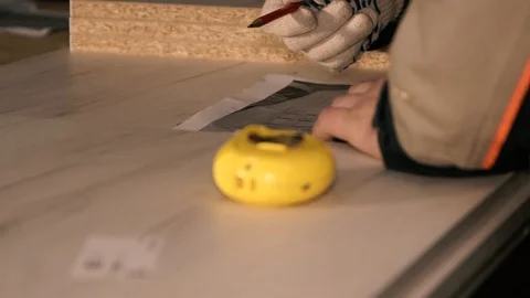 Men in the workplace. Discuss an action plan. Holding a measuring tape Stock Footage 125425793