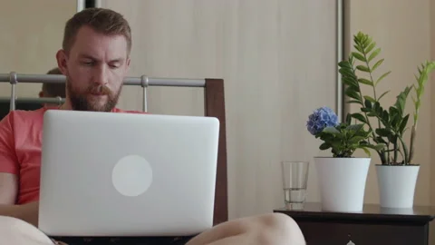 Men works remotely from home Stock Footage 152907113