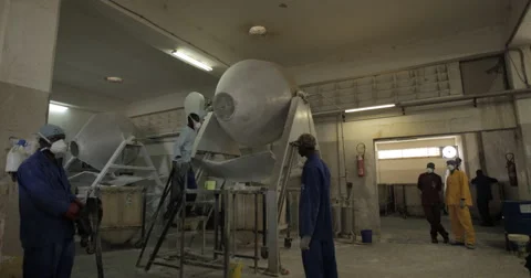 Men In Workshop Using Mixer To Mix Powder (4K) Stock Footage 60938563