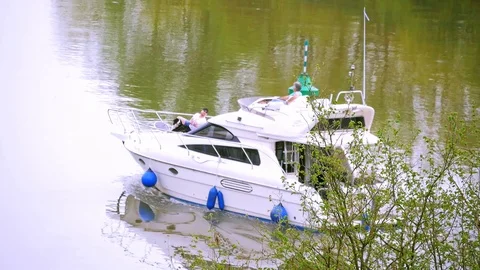 Men yachting at the river Stock Footage 89932877