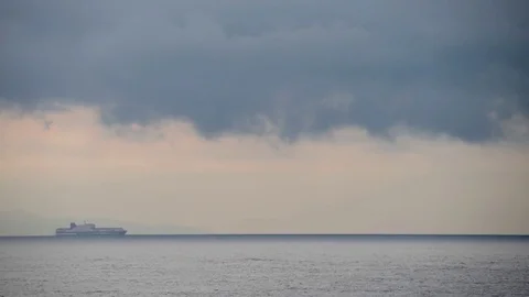 Menacing clouds and black leave the clear sky on the dark Stock Footage 83389507