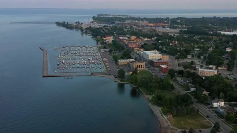 Menominee, Mi shore and marina aerial view at sunset Stock Footage