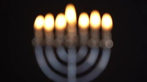 Menorah With All Candles Burning on Black Background Stock Footage