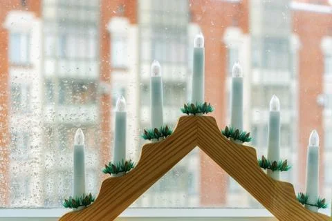 Menorah in front of the window. Stock Photos