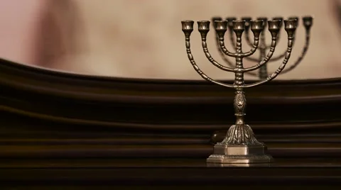 Menorah on wooden table Stock Footage 53428844