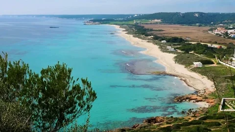 Menorca, Son Bou offering a beautiful beach for a lazy vacation Stock Footage 73239175