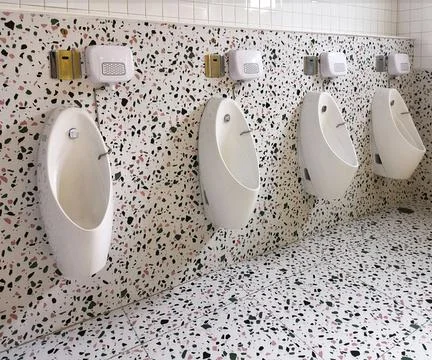 Men's bathroom with beautiful tile patterns Stock Photos