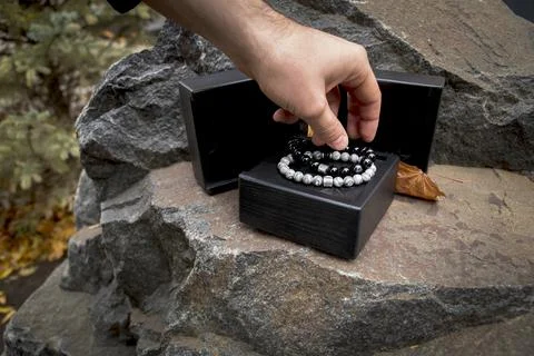 Men's bracelets made of natural stone Stock Photos