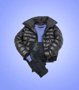 Men's casual clothes on blue background Stock Photos