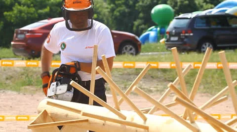 Men's chainsaw log cutting Stock-Footage 24985505