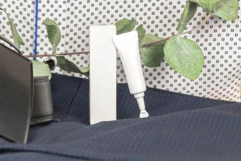 Men's cosmetics. Basic skin care products for men, eye or day cream concept Stock Photos