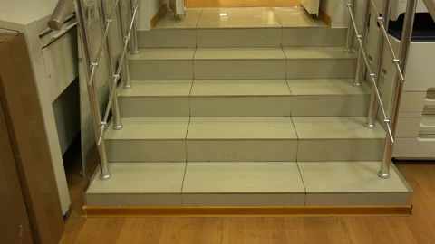Men's feet step up the steps Stock Footage 111161204