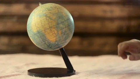 Men's hand captures the world Stock Footage 89029882