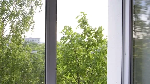 Men's hand closing a window Video stock 83857752