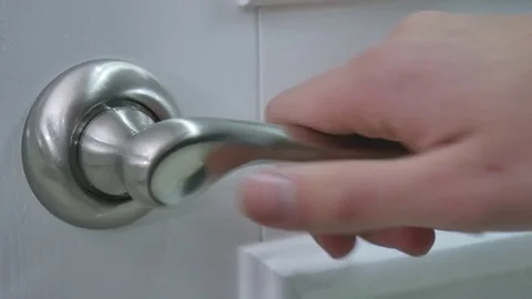 Men's hand opens the door Stock Footage 83844235