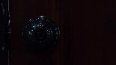Men's hand opens door knobs. Stock Footage 90110521